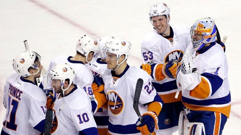 New York Islanders center Casey Cizikas (53) smiles