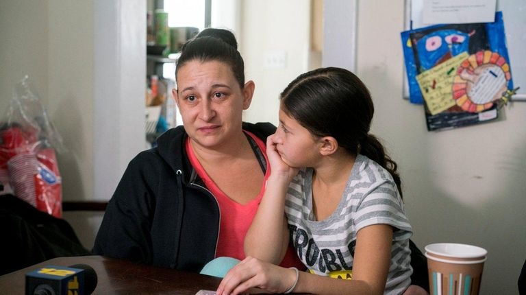 Terese Uveno, 35, and her daughter Isabella, 8,
