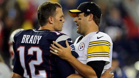 New England Patriots quarterback Tom Brady, left, speaks