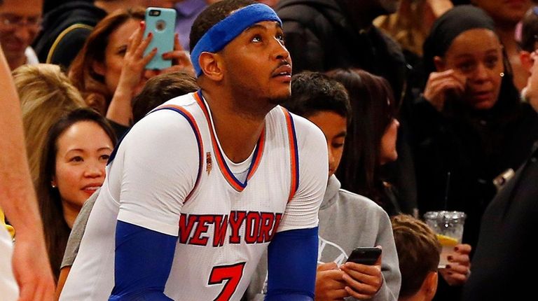 Carmelo Anthony of the New York Knicks sits