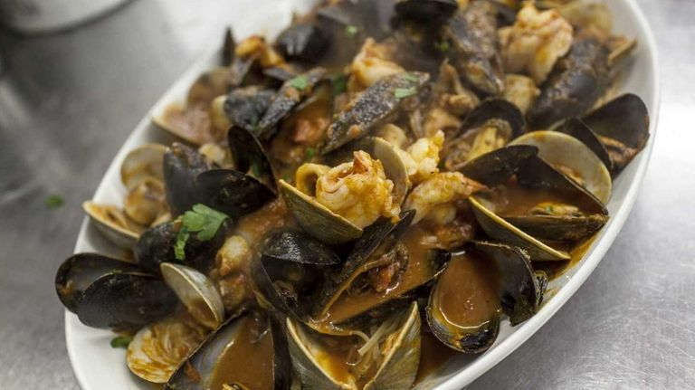 A family style portion of seafood fra diavolo