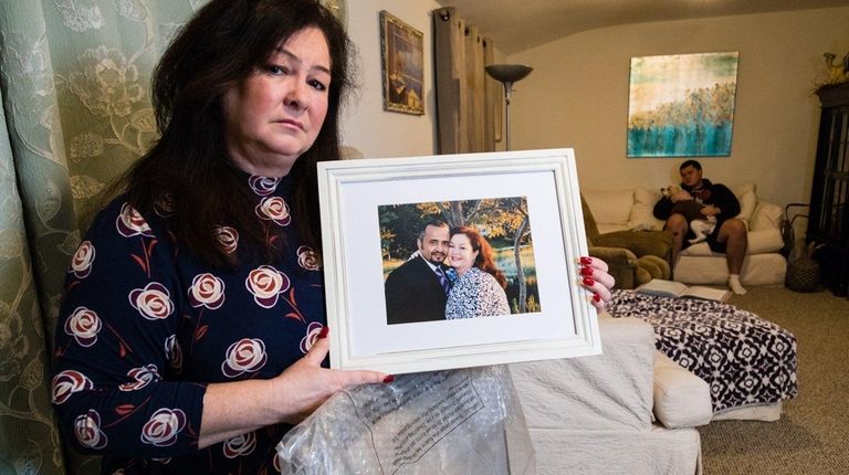 Barbara Gundrum with a picture of her with