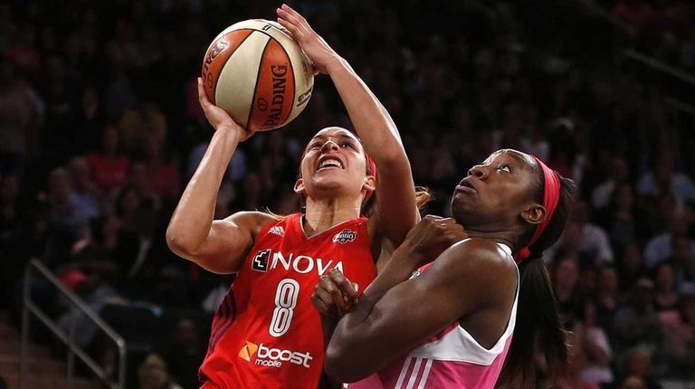Washington Mystics' Bria Hartley goes to the basket