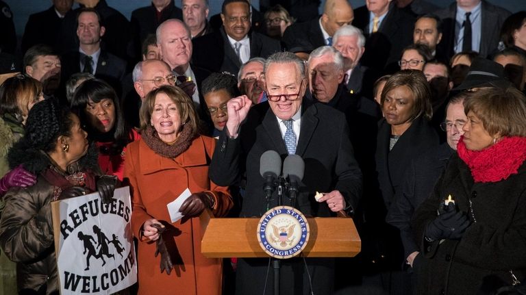 Senate Minority Leader Chuck Schumer, center, House Minority