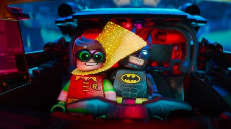 Robin (voiced by Michael Cera), left, and Batman