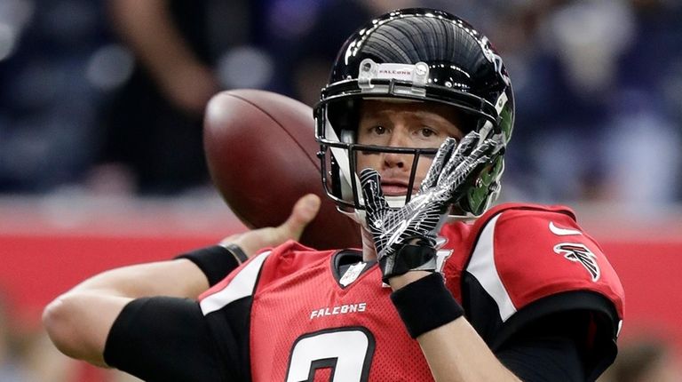 Atlanta Falcons quarterback Matt Ryan warms up before
