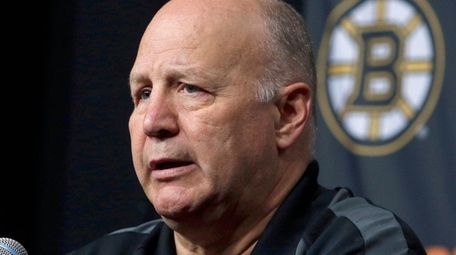 Boston Bruins head coach Claude Julien speaks at