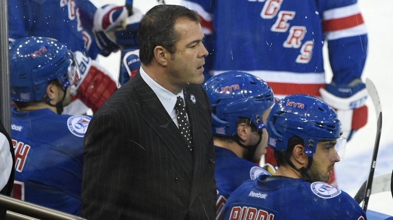 New York Rangers head coach Alain Vigneault looks