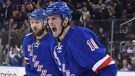New York Rangers left wing J.T. Miller, right,
