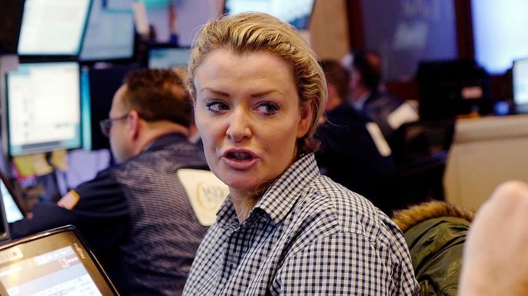Stock traders follow prices, Thursday, Feb. 9, 2017,