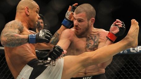 Catchweight Jim Miller, right, defeated Thiago Alves by