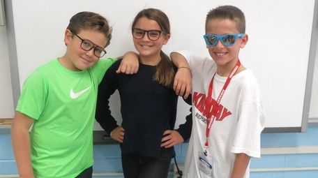 Kidsday reporters, from left, Joseph Pace, Isabella Basini