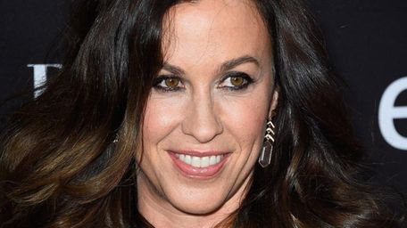 Alanis Morissette arrives at an event on May