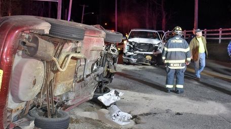 Firefighters respond to a crash at Mill and