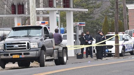Suffolk County police investigate on Thursday, Feb. 23,