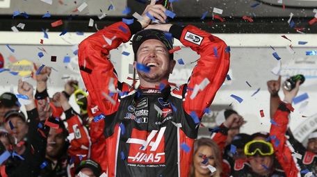 Kurt Busch celebrates in Victory Lane after winning