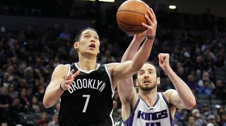 Brooklyn Nets guard Jeremy Lin drives to the