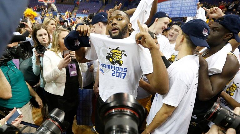 Wichita State's Shaq Morris and his teammates react