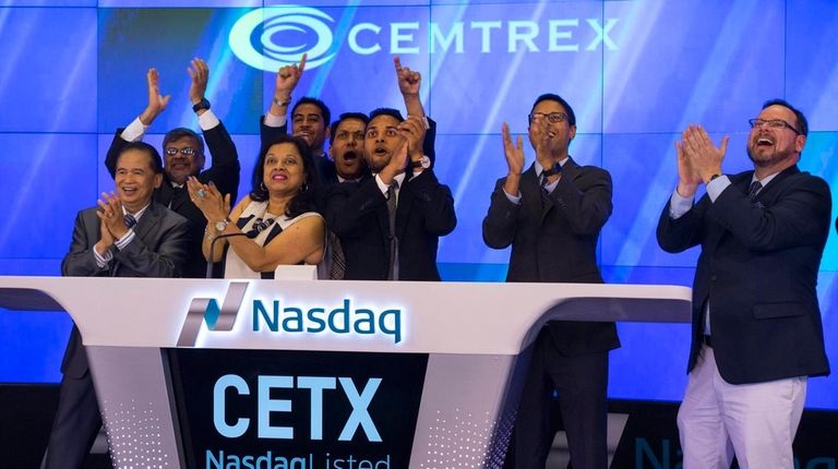 Cemtrex executives and family members ring the closing