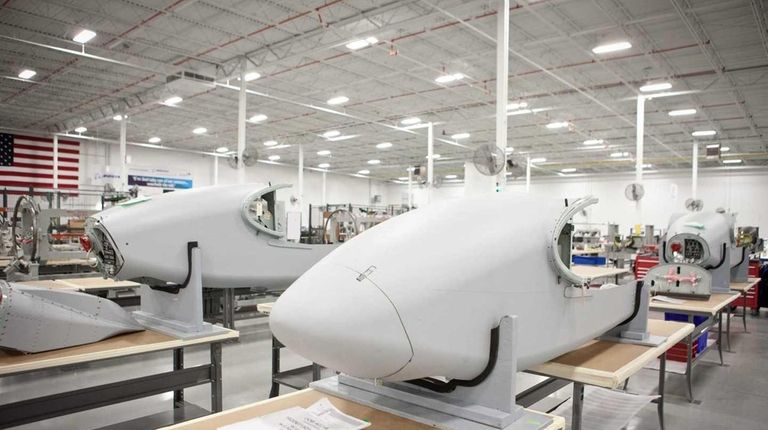 Aircraft parts are manufactured on the factory floor