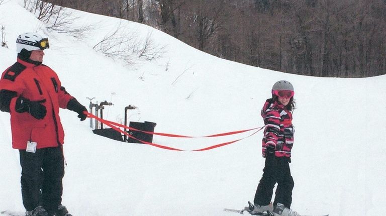 Kidsday reporter Kate Petrucelly skis with family friend