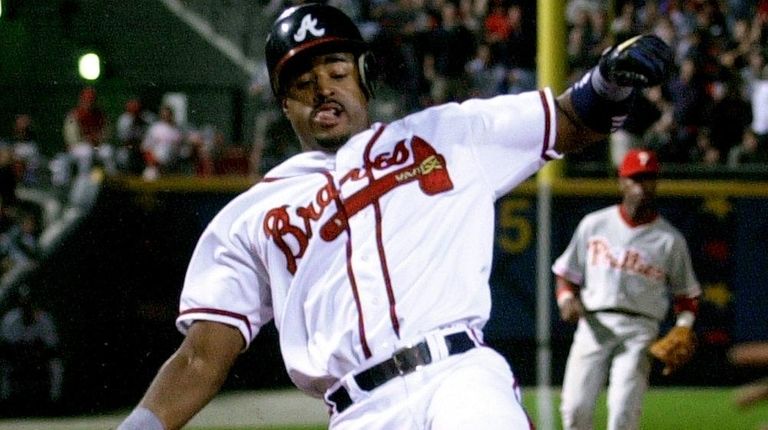 Atlanta Braves' Brian Jordan is all alone as