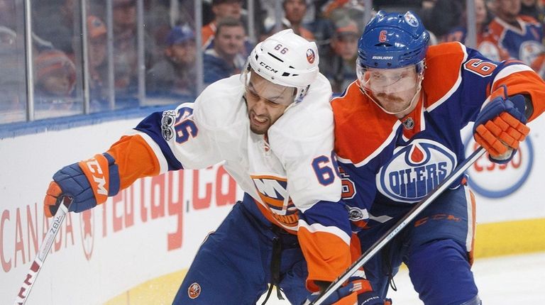 New York Islanders' Josh Ho-Sang (66) and Edmonton