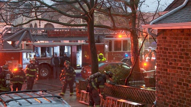 Five firefighters were injured battling an early morning