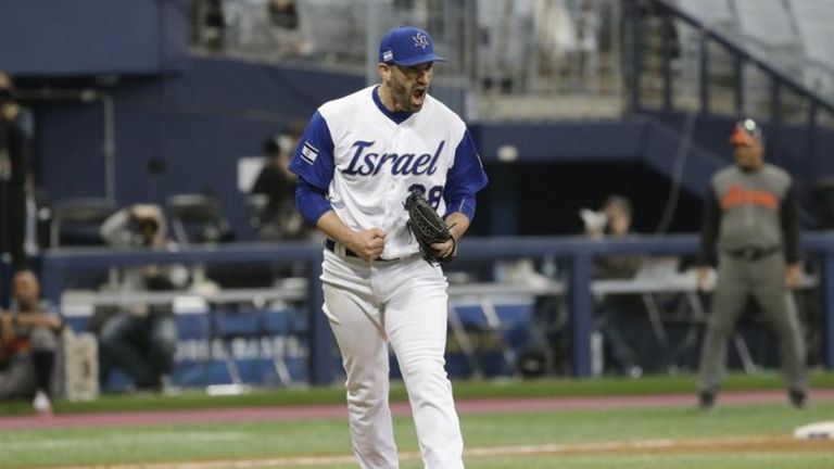 Israel's pitcher Josh Zeid celebrates his team's victory