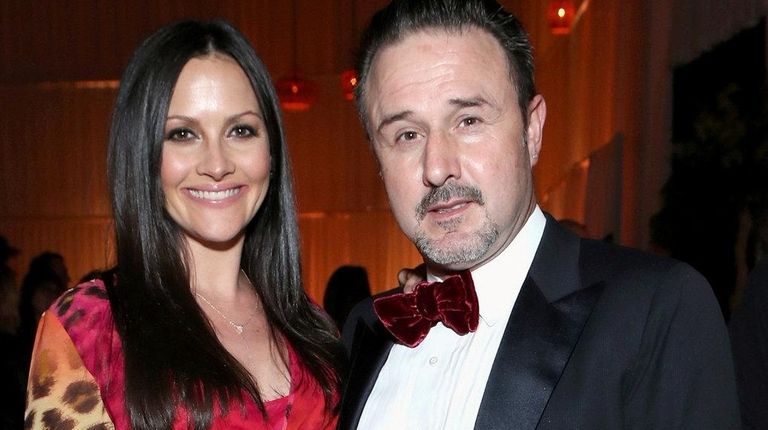 David Arquette, right, and his wife Christina McLarty