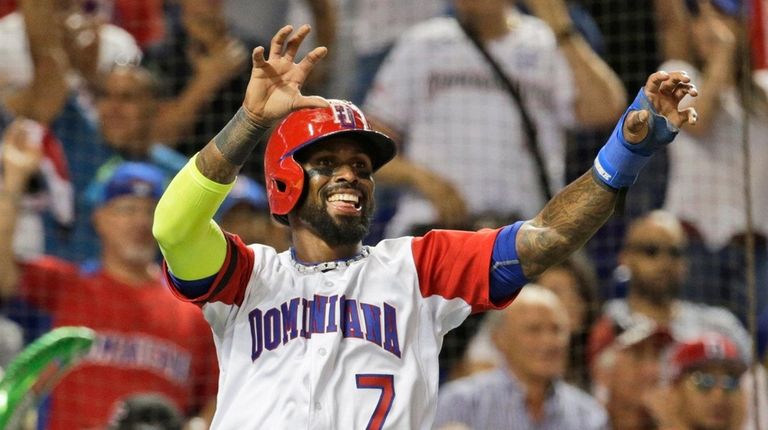 Dominican Republic's Jose Reyes celebrates after scoring on