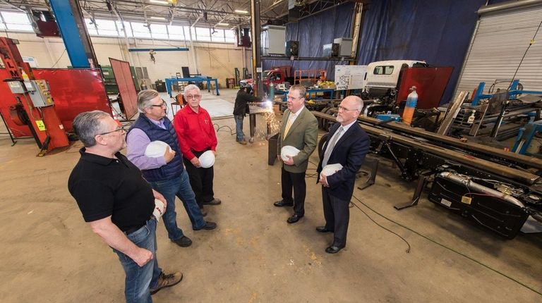 Babylon Town IDA officials Frank Dolan, far right,