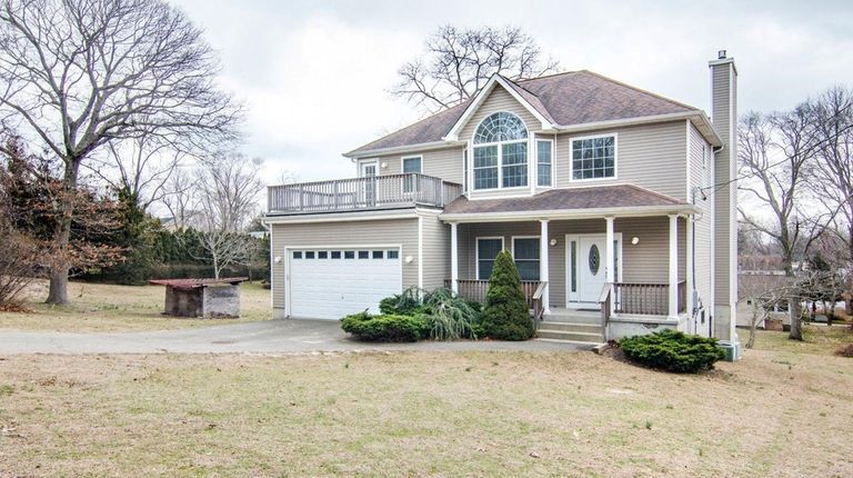 This four-bedroom house in Mattituck has three decks