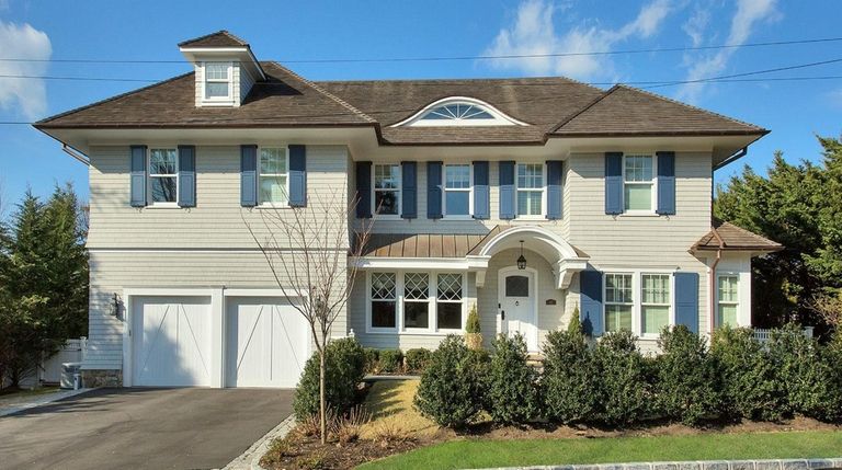 This circa-1908 mansion in Plandome Manor is listed