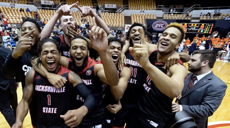 Jacksonville State players celebrate after defeating Tennessee-Martin in
