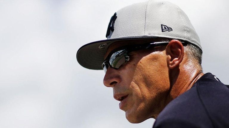 Yankees manager Joe Girardi watches from the dugout