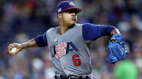 United States' pitcher Marcus Stroman delivers in the