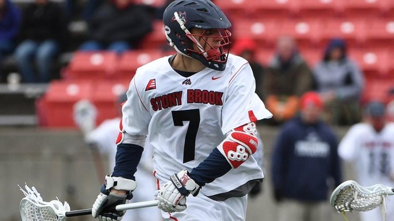 Stony Brook midfielder Alex Corpolongo drives to the
