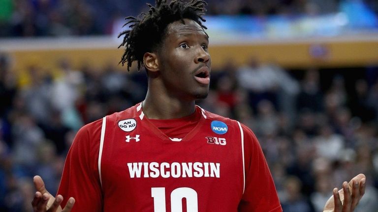 Nigel Hayes of the Wisconsin Badgers reacts after