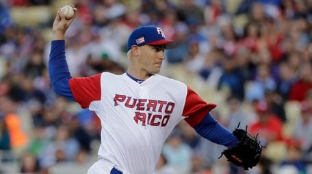 Puerto Rico pitcher Seth Lugo throws against the