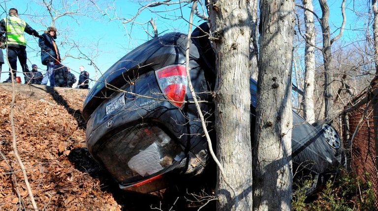 A car flipped over and down an embankment
