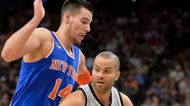 San Antonio Spurs guard Tony Parker (9) drives around