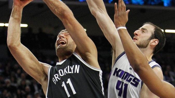 Brooklyn Nets center Brook Lopez drives to the