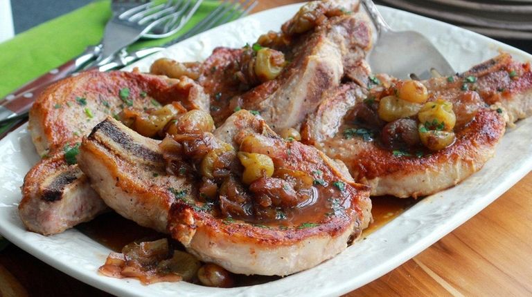 Pan-seared pork chops topped with a chunky relish