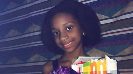 Kidsday reporter Kiara Poelinitz with her Gift 'ems.