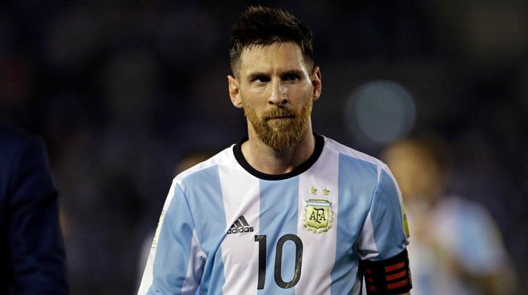 Argentina?s Lionel Messi leaves the pitch after a