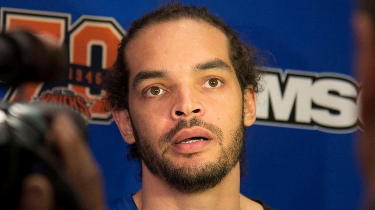 New York Knicks' Joakim Noah speaks with the