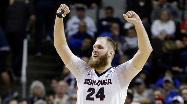 Gonzaga center Przemek Karnowski (24) celebrates in the