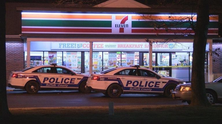Suffolk County police investigate the robbery of a