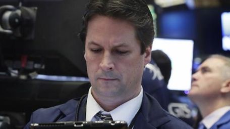 Trader Patrick McKeon works on the floor of